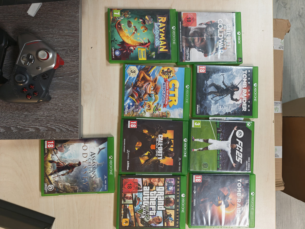 Xbox One X • 1TB • 2 kontrolera • 9 igara • 3mj Jamstvo